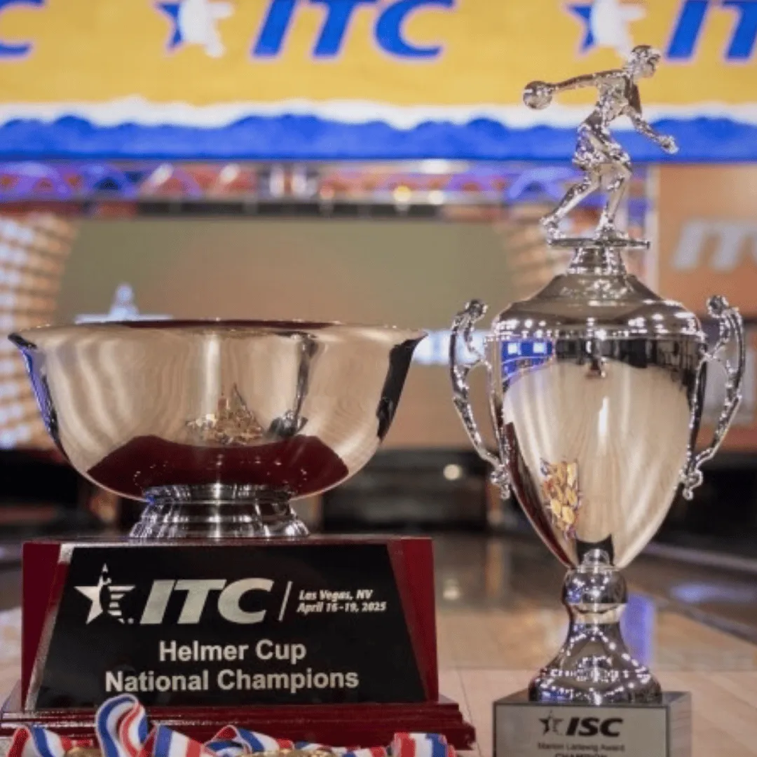 Intercollegiate Bowling Championships cups and awards on a bowling lane