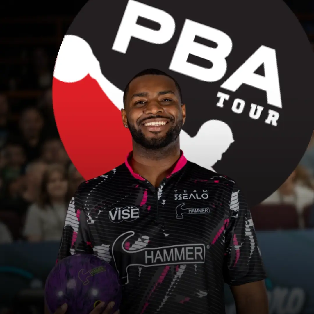 PBA Tour bowler Cam Crowe smiling holding a bowling ball