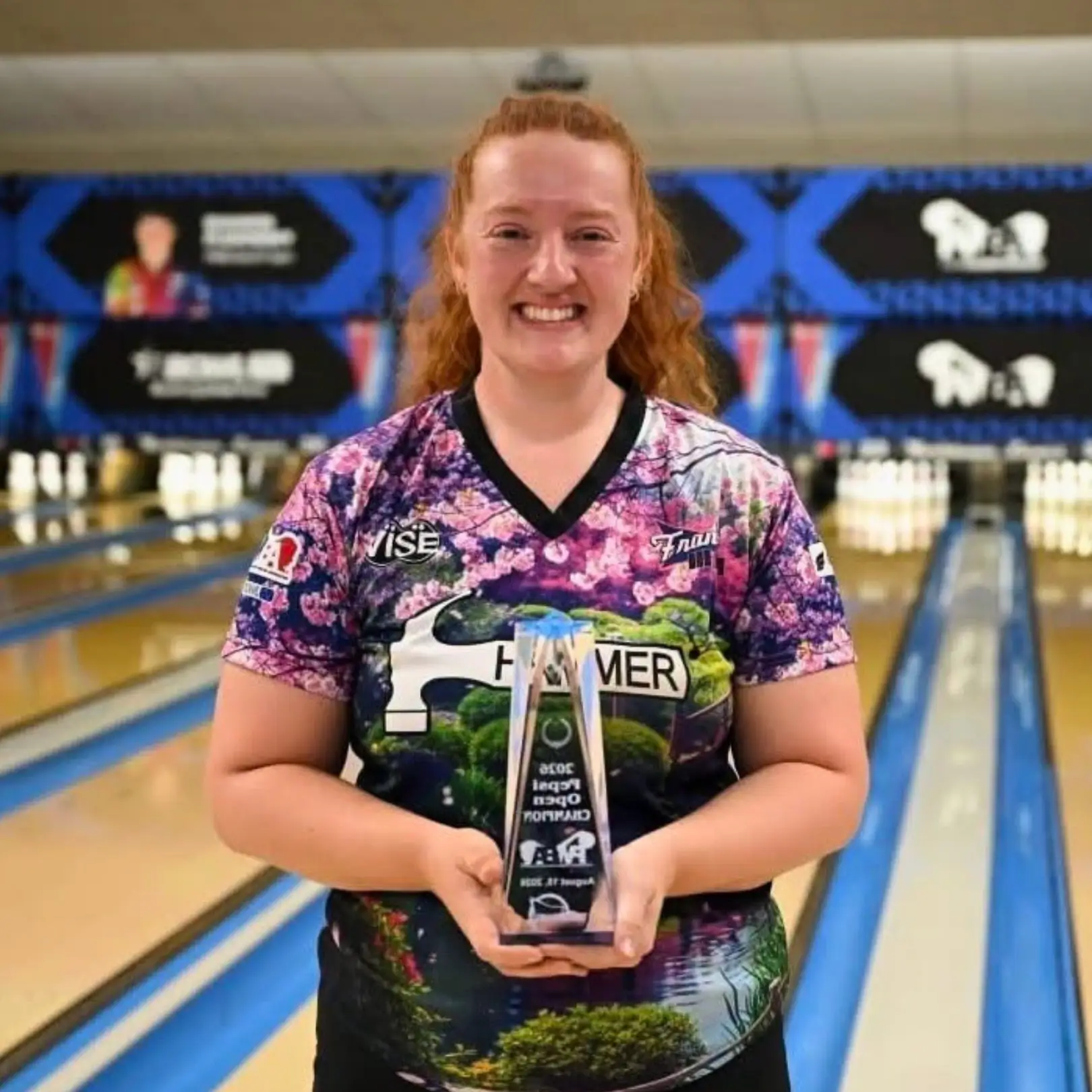 Alexis Runk holding the trophy after winning her first PWBA title at the 2026 PWBA Pepsi Open