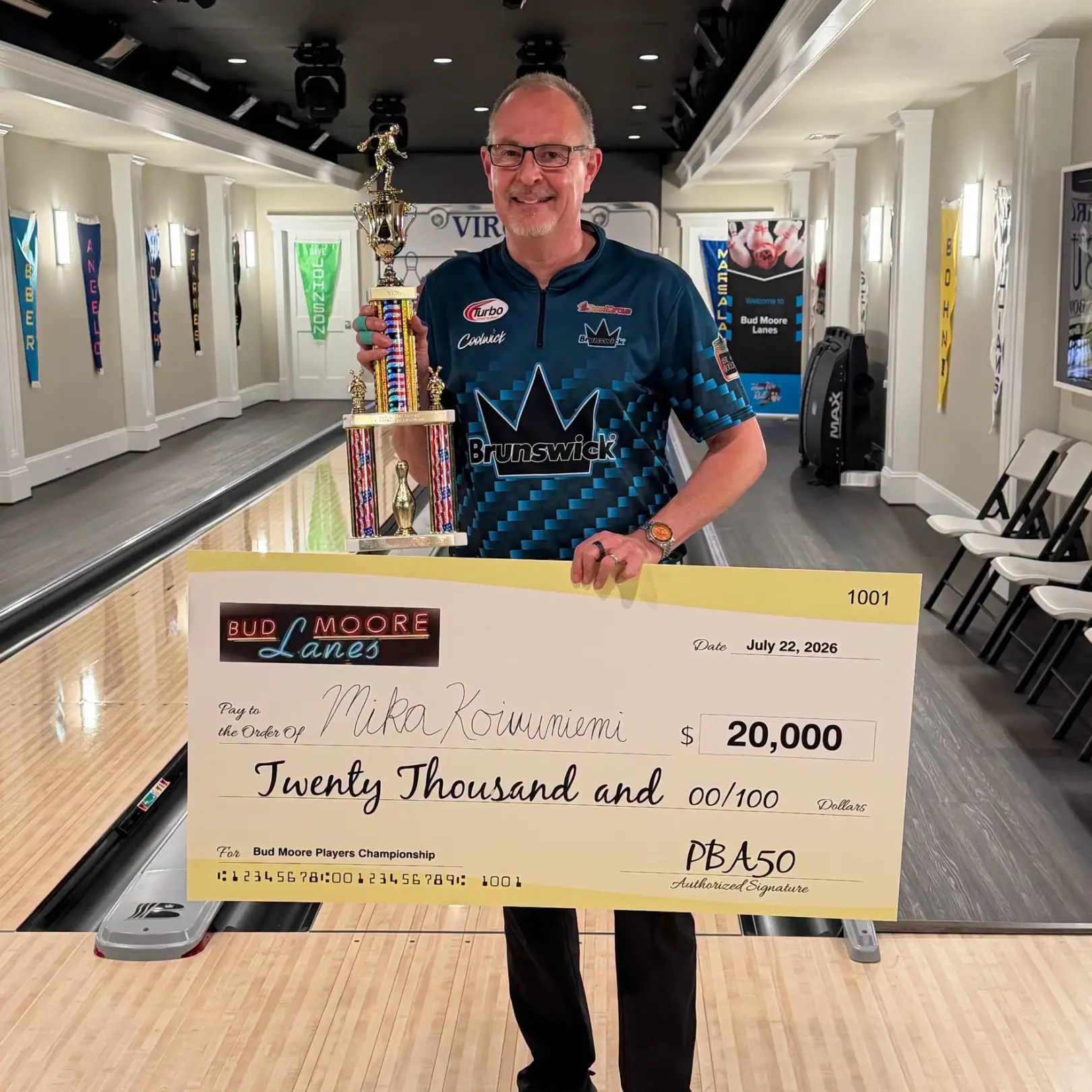 Mika Koivuniemi celebrates winning the Bud Moore PBA50 Players Championship at the private Bud Moore Lanes.